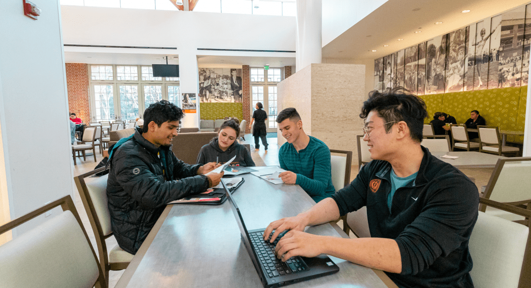 Group of students working on their research