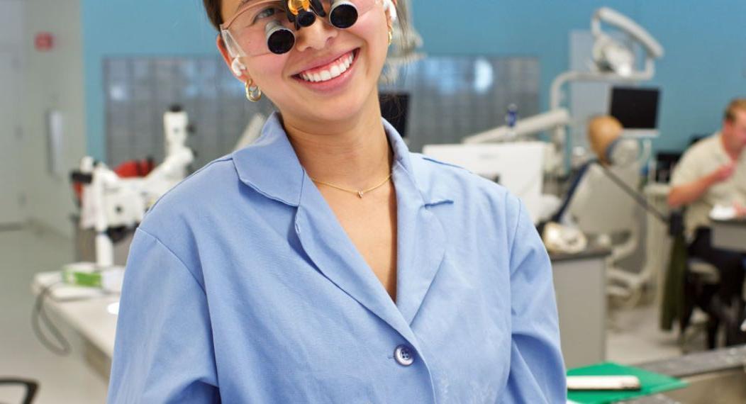 Student with magnifiers