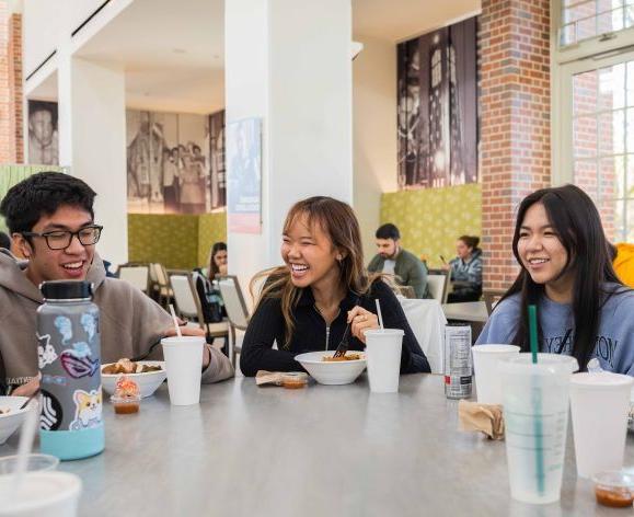 students enjoy lunch together